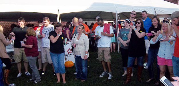 Outdoor tasting event under tent
